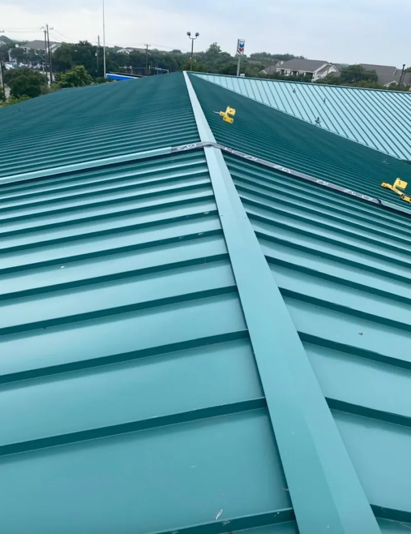 Green commercial metal roof ridge and valley for Metal Roof Repair in Winthrop Harbor
