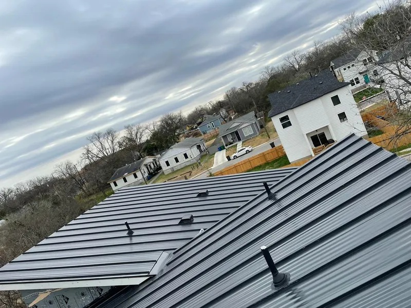 Standing seam metal roof panels with vents for Skylight Repair in Winthrop Harbor